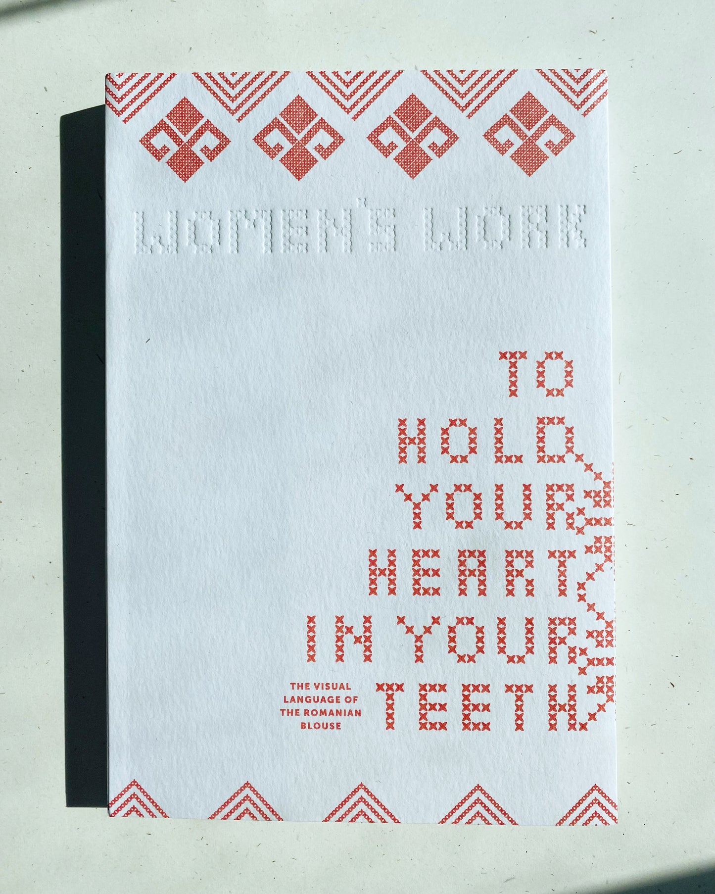 TO HOLD YOUR HEART IN YOUR TEETH